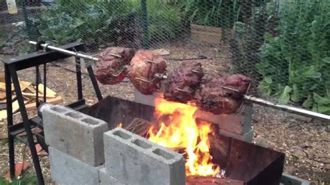 Pork Shoulders And Boston Butts On Spit YouTube