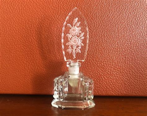 Vintage Perfume Bottle With Delicate Etched Roses On The Stopper Has Original Dauber Art Deco