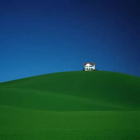 Liminal Space Of A Very Green Hill With A House On It