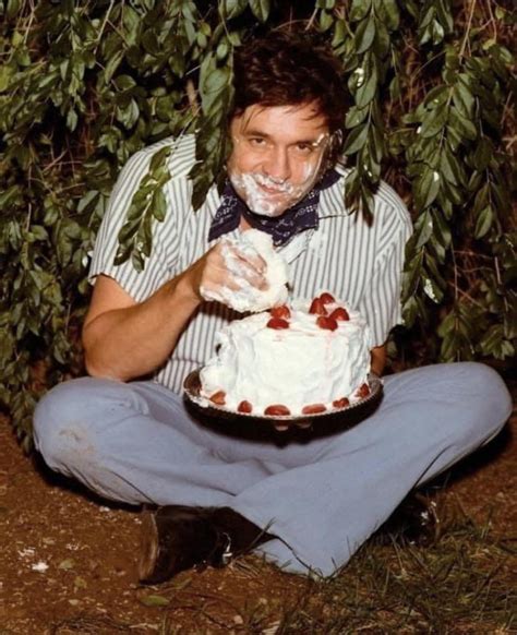 Johnny Cash Eating Cake Underneath A Bush Circa Gag