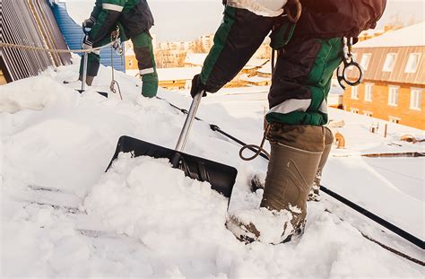 Removing Snow From Commercial Flat Roofs Iko