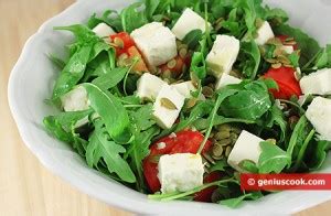 Insalata Di Rucola Con Formaggio Di Capra E Pomodoro Antipasti