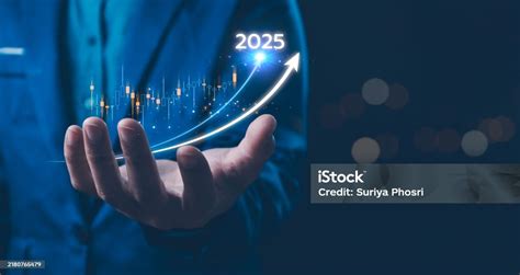 A Businessman Hold A Futuristic Graph Projecting Growth Toward The Year ...