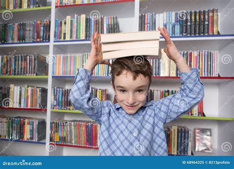 Cute Boy Reading Book In Library Stock Image Image Of Read Desk