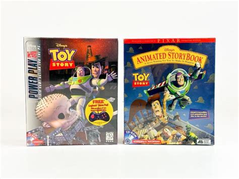 Lot - Vintage Pixar Disney Buzz Lightyear Toy and Toy Story CD-ROMs