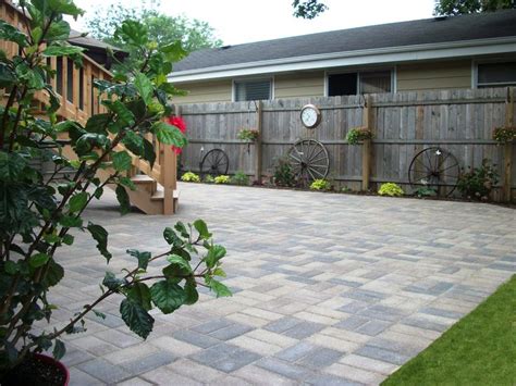 A Brick Patio In Front Of A House