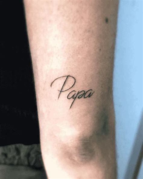 A Womans Leg With The Word Papa Tattooed On Her Left Arm And Foot