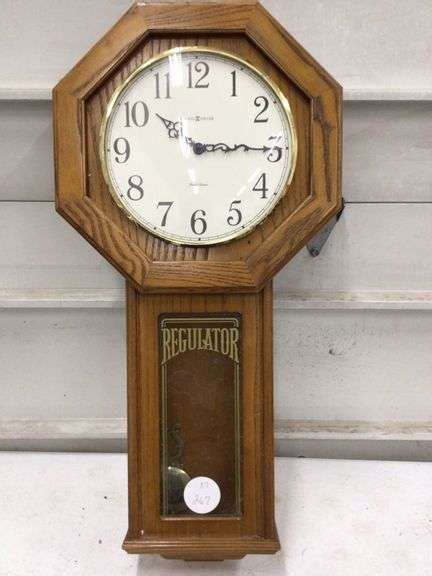 HOWARD MILLER PENDULUM WALL CLOCK Currie Auction Service