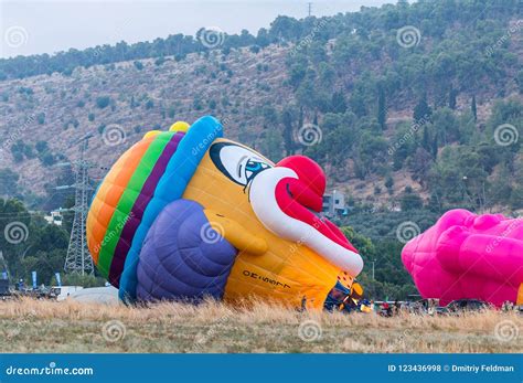 The Maintenance Team Inflates The Hot Air Balloon In The Shape OThe