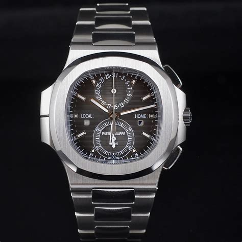 Patek Philippe Nautilus Travel Time Ref Full Set Romain R A