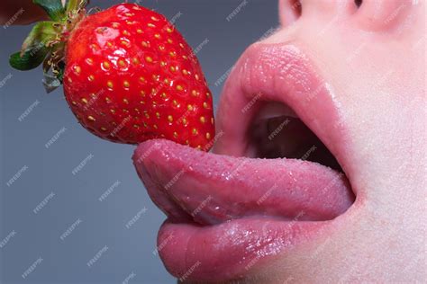 Premium Photo Girl Mouth Eating Strawberry Closeup Sexy Open Mouth With Long Tongue Lick