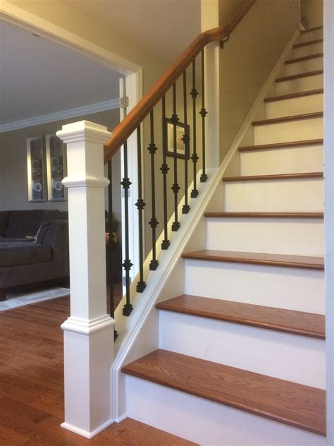 Wood railing with wrought iron balusters – Lux Design and Contracting