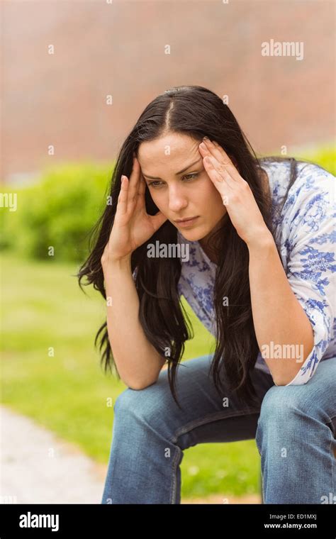 Casual Brunette Suffering From Headache Stock Photo Alamy