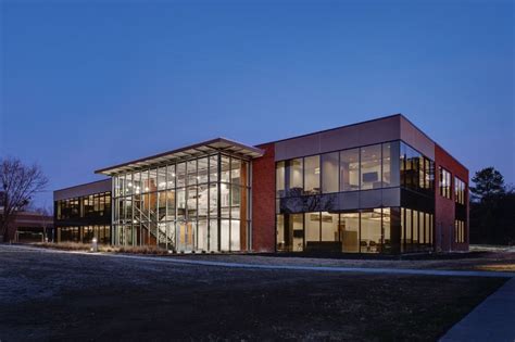 Three Story Brick Building With Glazed Addition Building