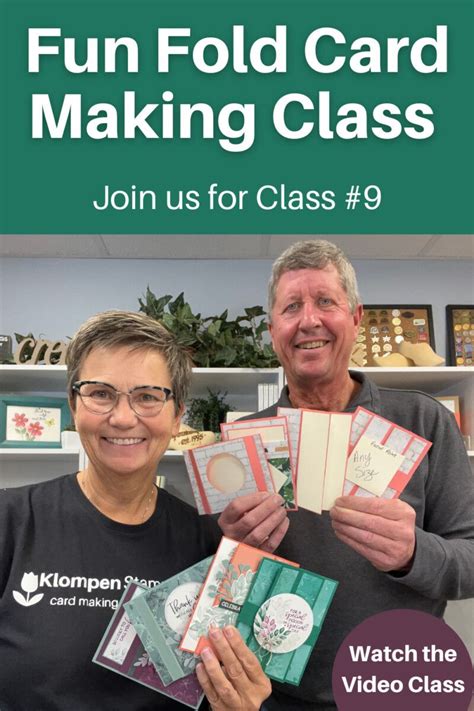 Two People Holding Up Some Cards In Front Of A Green Sign That Says Fun