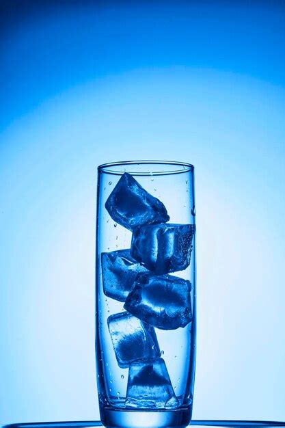 Premium Photo Drops Of Water Falling Into Deep Blue Water