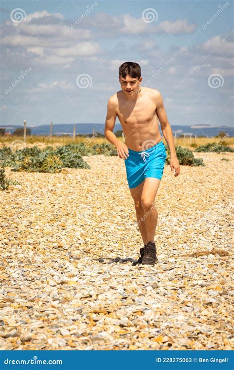 Shirtless Teenage Boy Running On A Beach Stock Image Image Of Running