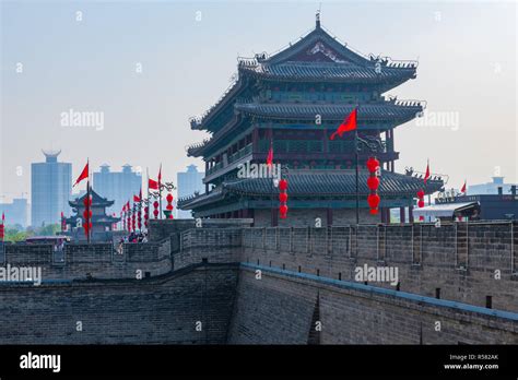 View Of Xian City Wall Ramparts With Modern City In Background Stock