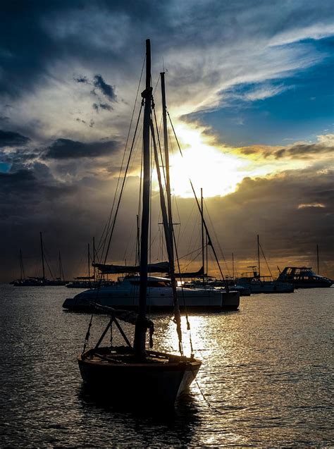 Boats And Rays Of Sun Photograph By Erik Lunoe Fine Art America