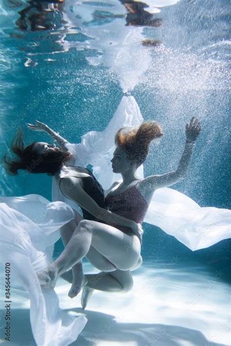 Two Beautiful Lesbian Girls Are Swimming Underwater Attractiveness