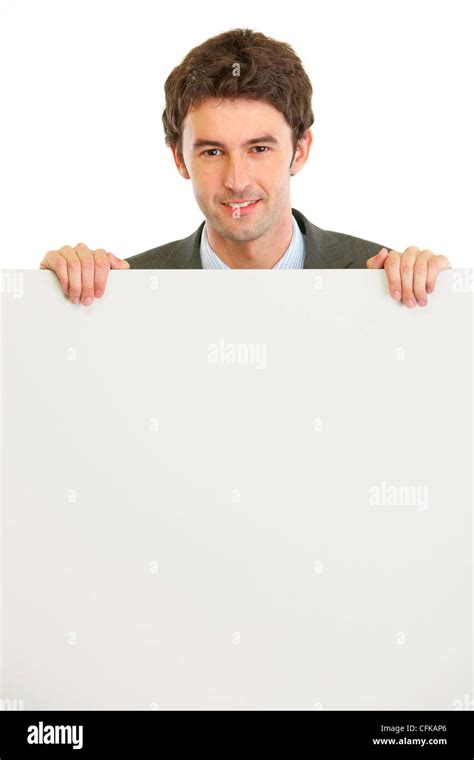 Handsome Guy Holding Blank Billboard Isolated On White Stock Photo Alamy