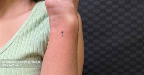 Minimalistic Letter T Tattoo Located On The Wrist