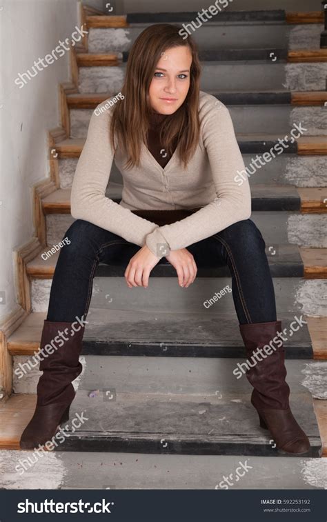 Beautiful Brunette Girl Posing Sitting On Stock Photo 592253192 Shutterstock