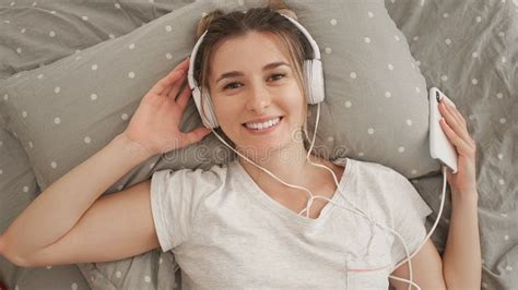 Happy Woman Or Teenage Girl In Headphones Listening To Music From