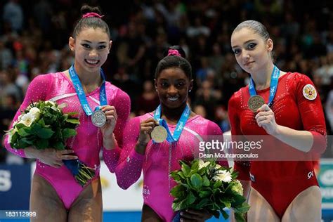 Kyla Ross Of Usa Simone Biles Of Usa And Aliya Mustafina Of Russia