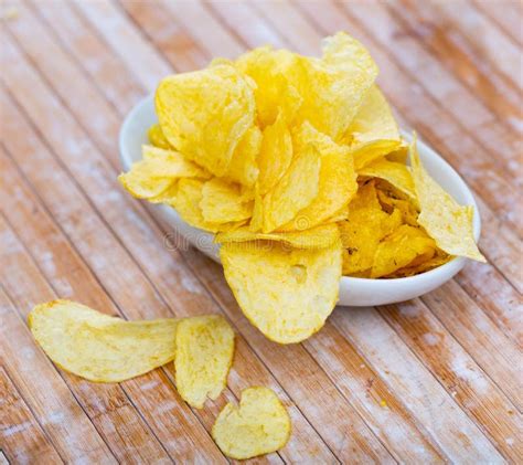 Crispy Salty Potato Chips With Natural Taste On Plate Stock Image