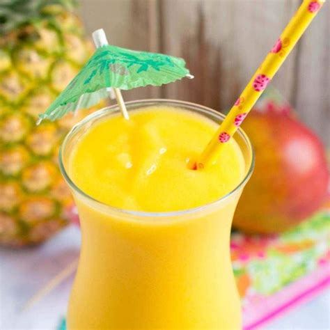 Frozen Pineapple Mango Vodka Slush Champagne And Coconuts