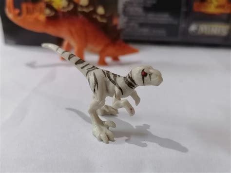 Mattel 2022 Jurassic World Dominion Mini Dino Wave 1 Atrociraptor White Brown Stripes