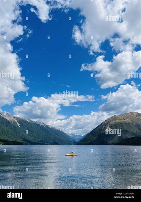 Kayaker On Lake Rotoiti Nelson Lakes National Park New Zealand Stock