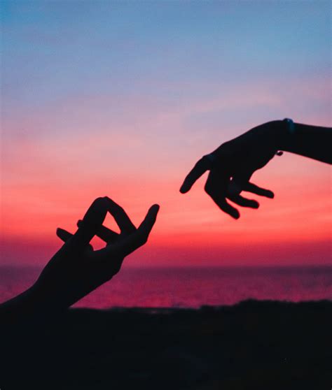 Silhouette Of Hands Against The Sky At Sunset · Free Stock Photo