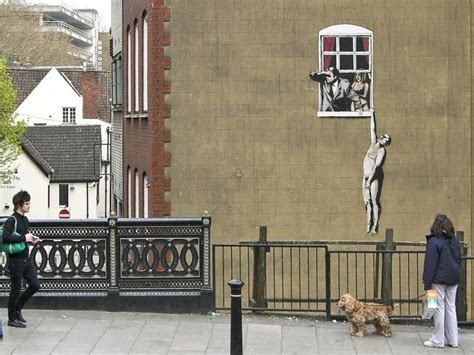 Naked Man Hanging From Window Must See Banksy Street Art Around The