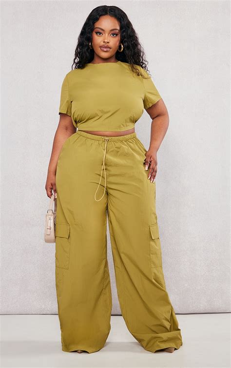 Plus Olive Nylon Wide Leg Cargo Pants Plus Size Prettylittlething Usa