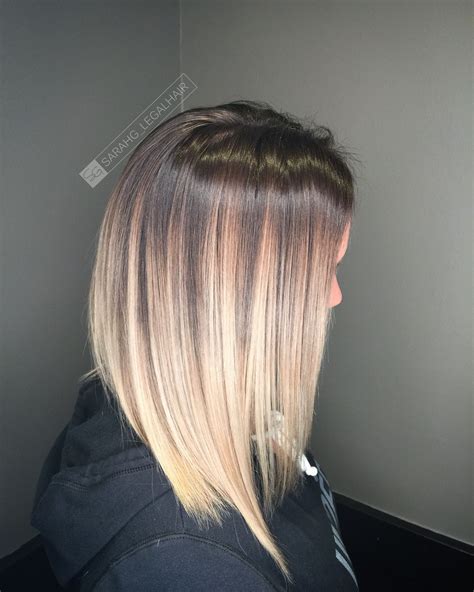 Rooted blonde Reverse ombré Brown to platinum blonde Balayage hair