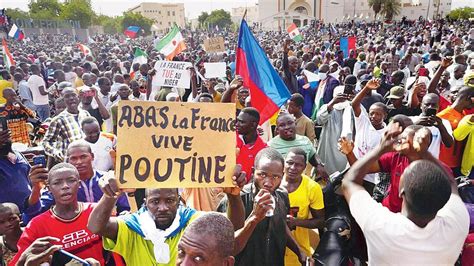 Niger Coup Supporters March In Capital Waving Russian Flags