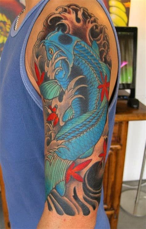 Blue Koi Fish Tattoo On Arm Tattooimages Biz