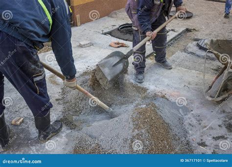 Worker Is Mixing The Cement By Hand Stock Image - Image: 36717101