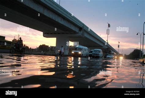 Commuters Are Passing Through Stagnant Sewerage Water Which Is Creating