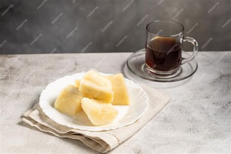 Premium Photo Cooked Cassava Served On Plate On The Table