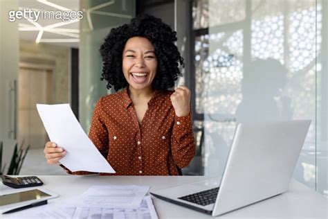 Portrait Of Successful African American Woman Boss At Workplace