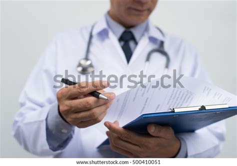 3911 Doctor Reading Chart Images Stock Photos And Vectors Shutterstock