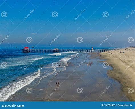 Aerial View Of Huntington Beach With The Pier On The Background