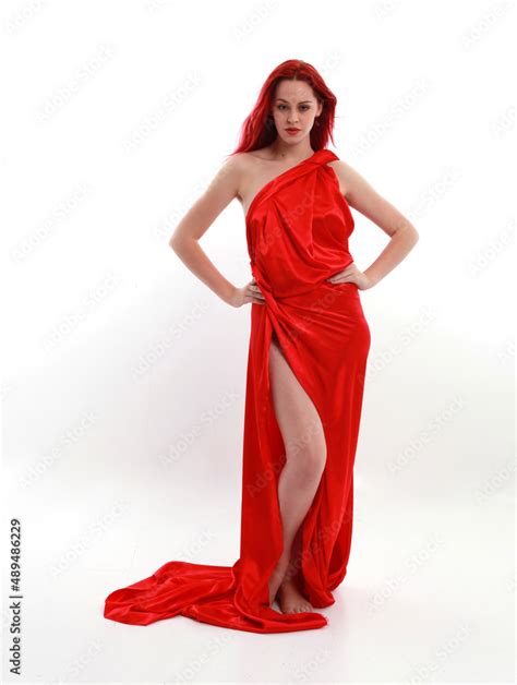 Full Length Portrait Of Red Haired Woman Wearing A Beautiful Sexy Silk