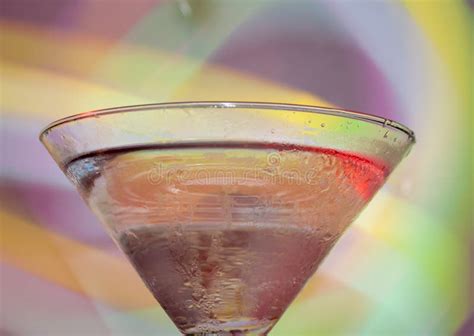 A Martini Glass with a Cocktail in Beautiful Light of Different Colors Stock Image - Image of ...