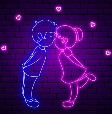 A Neon Sign With A Man Kissing A Woman On The Cheek In Front Of A Brick