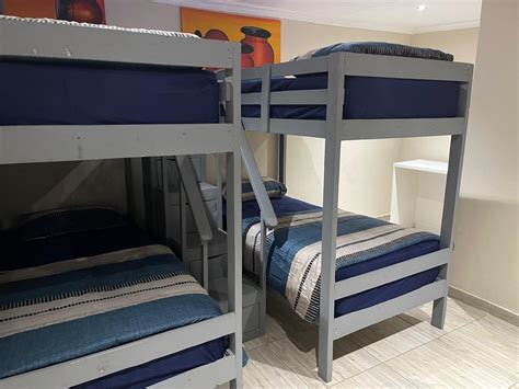 Community members gather at Mount Olivet Catholic Cemetery today 27