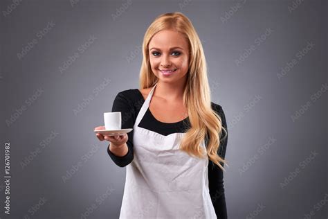 Young barista woman Stock Photo | Adobe Stock